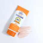 UV sun cream tube with a hand applying cream on a white background